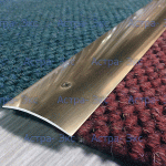 Стыковочный гладкий порожек ST48 округлой формы из алюминия. С отверстиями для саморезов.